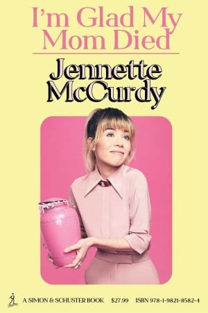 A picture of the cover of I'm Glad My Mom Died by Jennette Curdy. She is pictured holding a pink urn and smiling