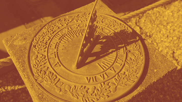 A photo of a sundial showing... three o'clock?